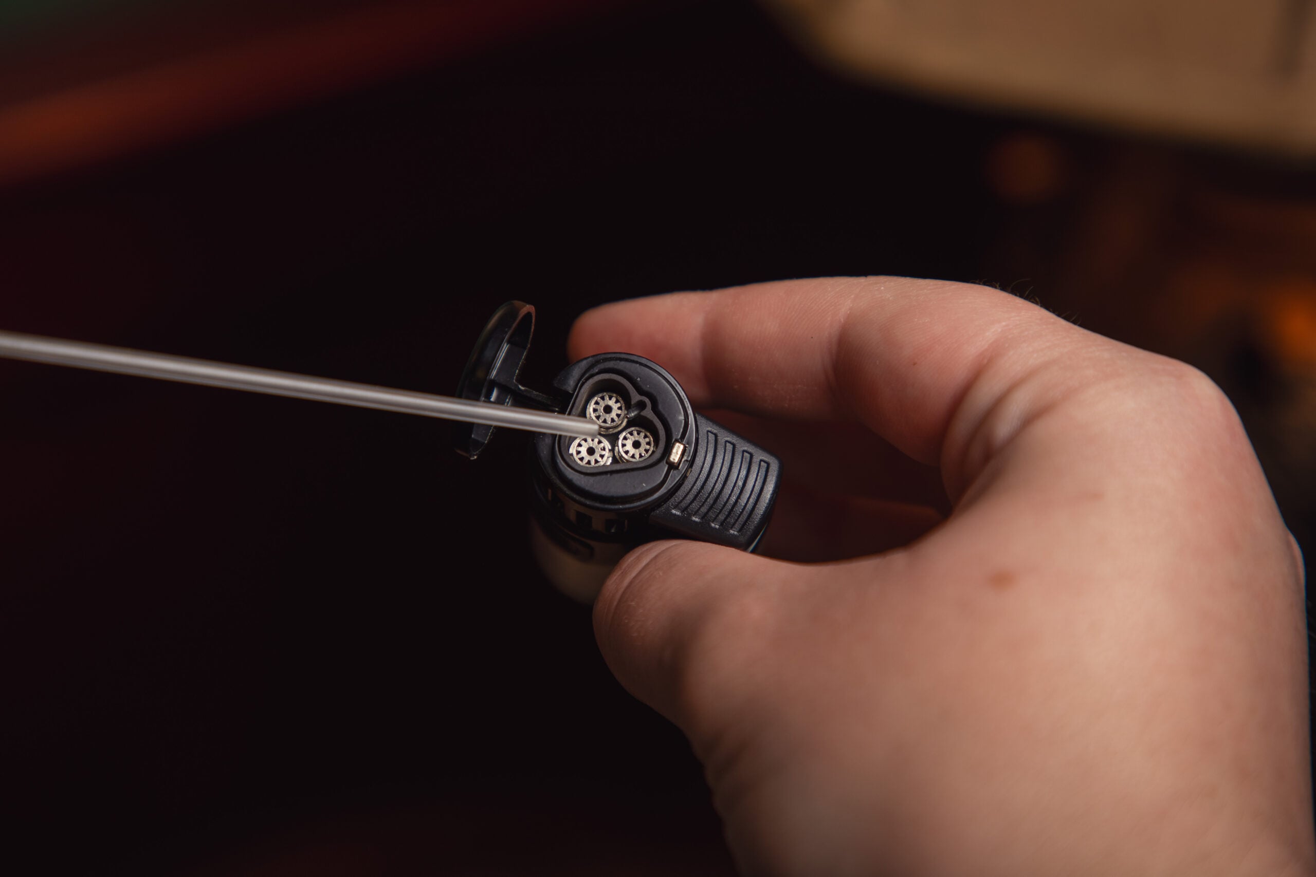 cleaning a cigar lighter with compressed air can
